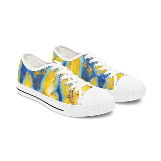 Wear a story of light.
Golden butterflies dance beneath an endless blue sky, inviting you to walk with courage, hope, and joy. Inspired by Olya Selivanova's original painting, these sneakers transform everyday moments into quiet reminders that beauty has the power to guide us home.